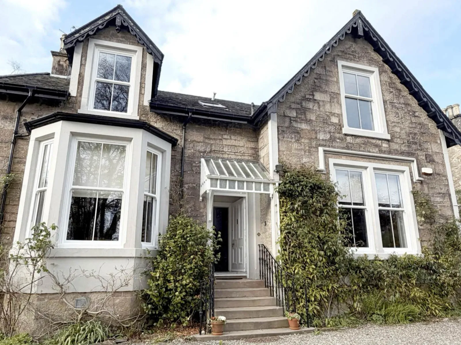 Traditional Glasgow stone villa with newly installed white sash and case windows